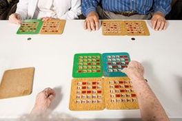 Three seniors playing bingo