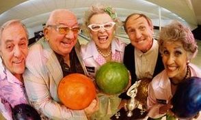 Portrait of a bowling team in a bowling alley